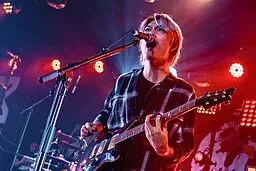 One Ok Rock in Budapest performing at Dürer Kert in 2019 (source: Frank Olivér Infinite Beat, via Wikimedia Co)